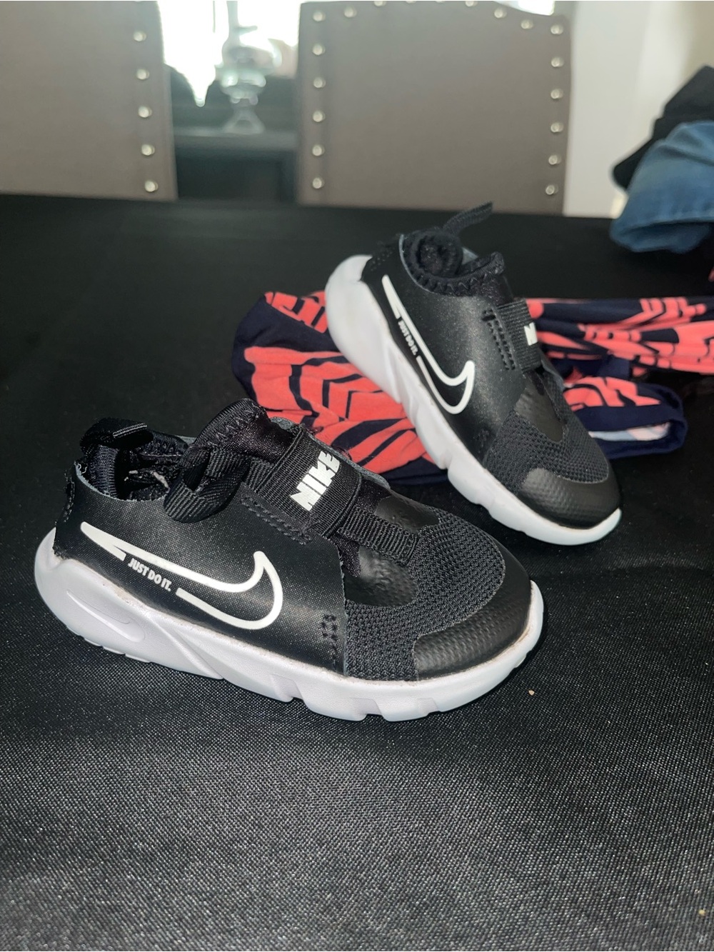 Nike Kids Black and White Slip-On Sneakers with Swoosh